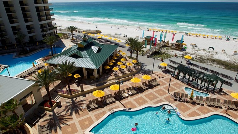 destin hilton hotel with view of pools