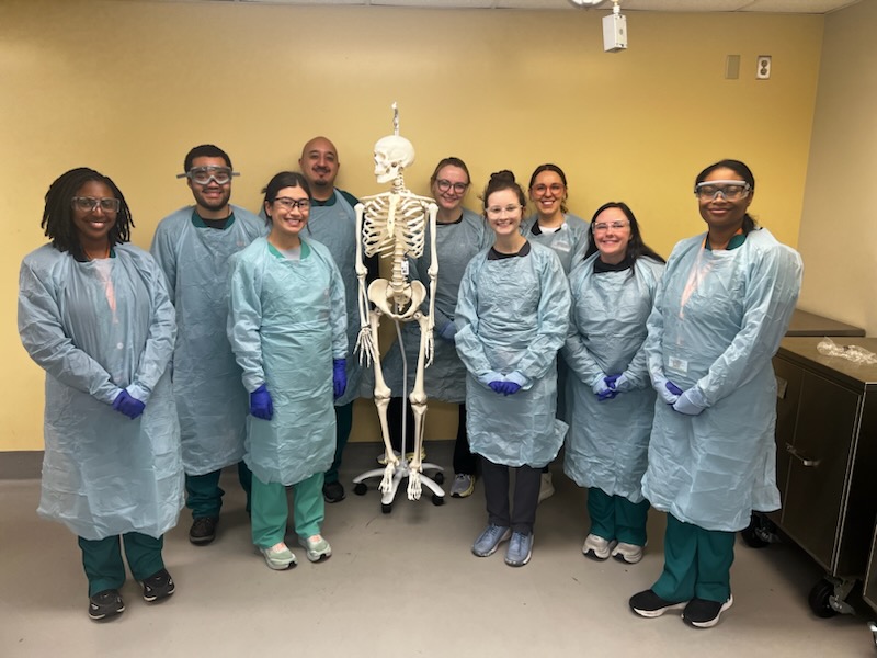 Pathologists’ Assistant students in scrubs.