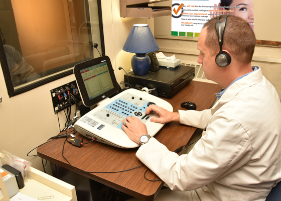 audiologist working