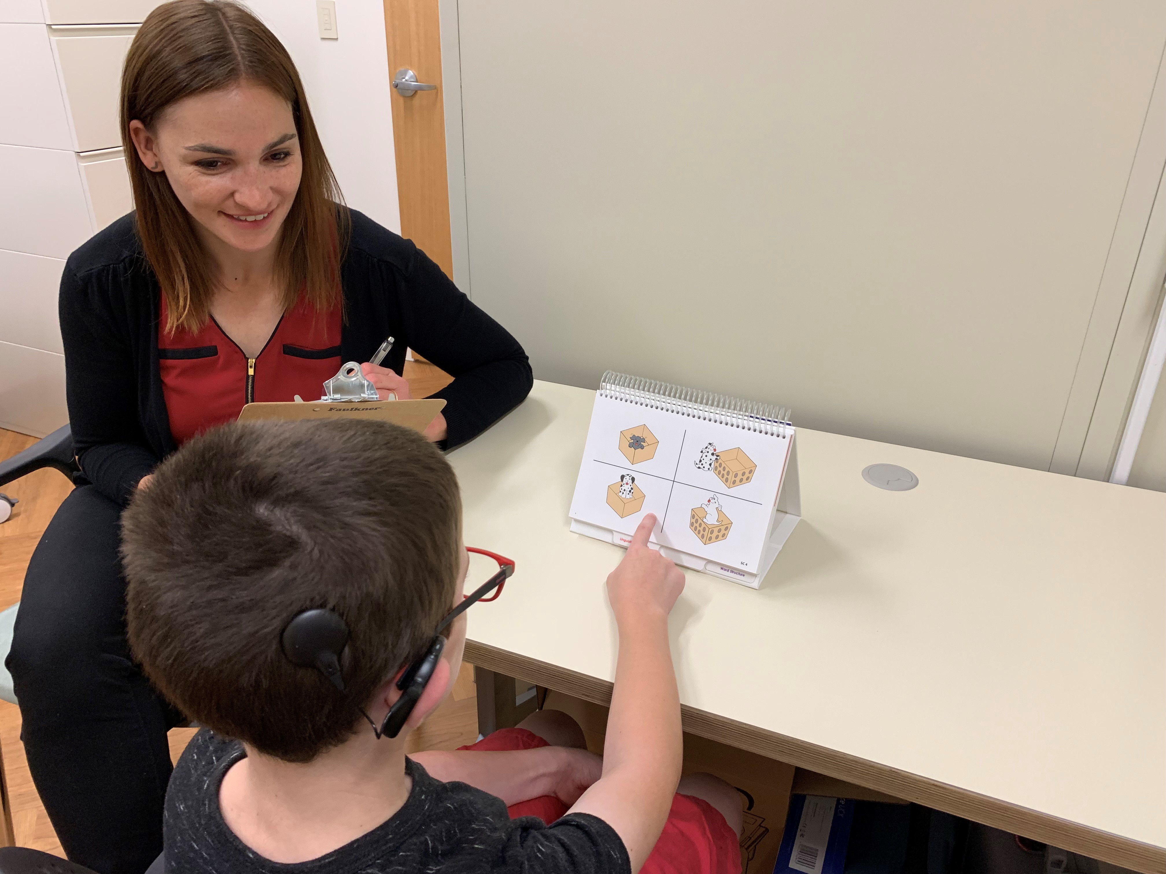 Dr. Klein working with language patient