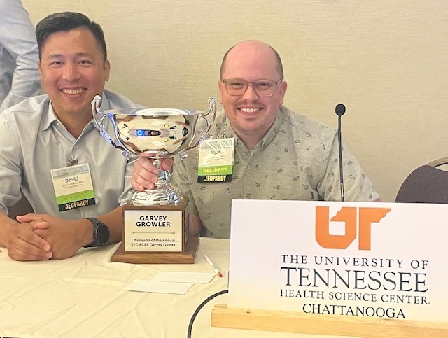 Residents smile after winning the Garvey Cup at ACEP 2023