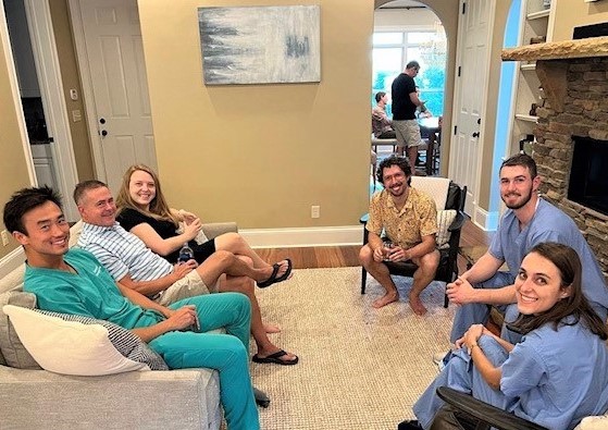 Faculty and residents meeting together at Journal Club