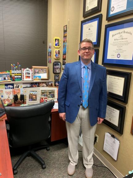 Dr. Cary in his office.