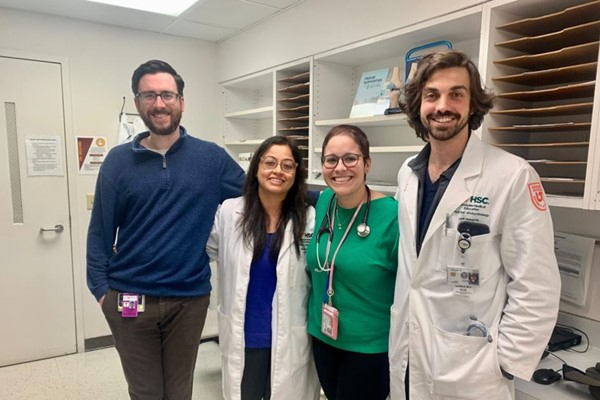 Four fellows in a hospital office