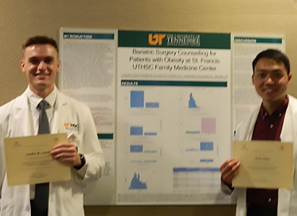 Residents before a research poster