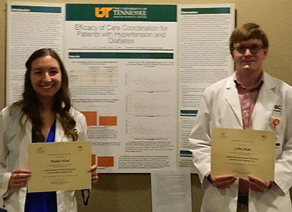 Residents before a research poster