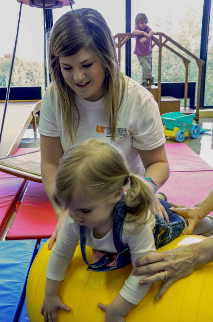 therapist working with child