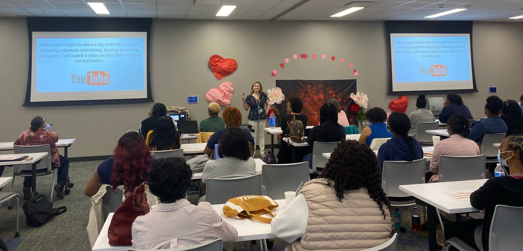 Dr. Anne Zachry is presenting a recent training session at Porter Leath.