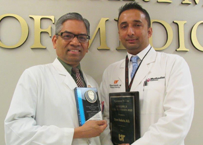 Dr. Dipen Kadaria receiving the 2015 recipient of the James L. Lewis Excellence in Teaching Award