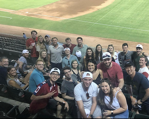 Residents at a baseball game