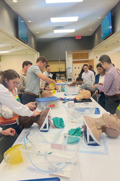 Residents observing the SIM center