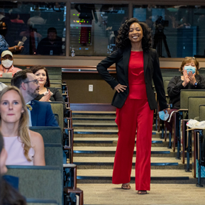 Female resident walking at graduation