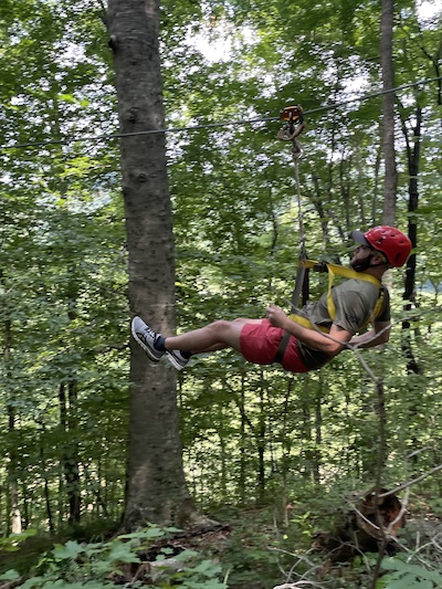 Resident outdoors ziplining