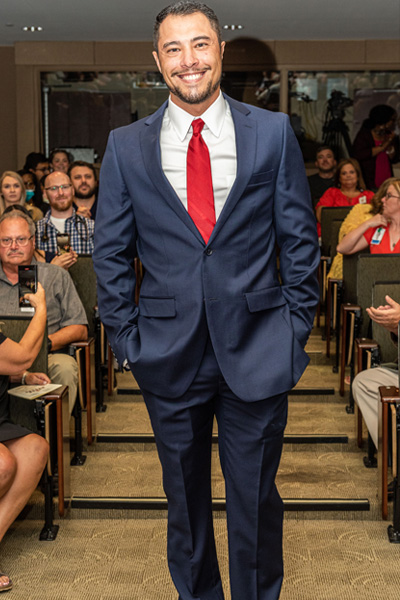 Resident in graduation audience aisle