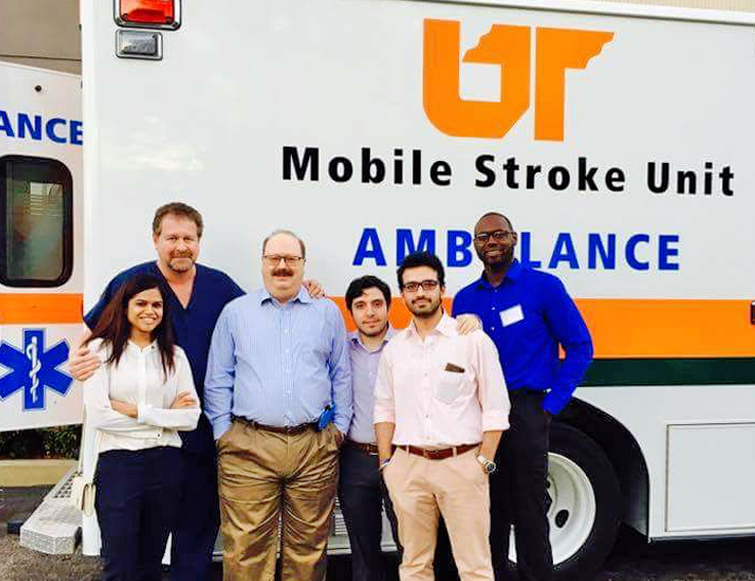 Residents/faculty outside by the Mobile Stroke Unit