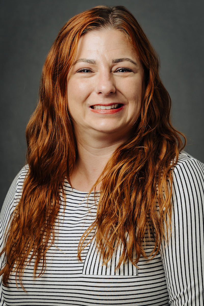 Dr. Shannon Rose woman with red hair