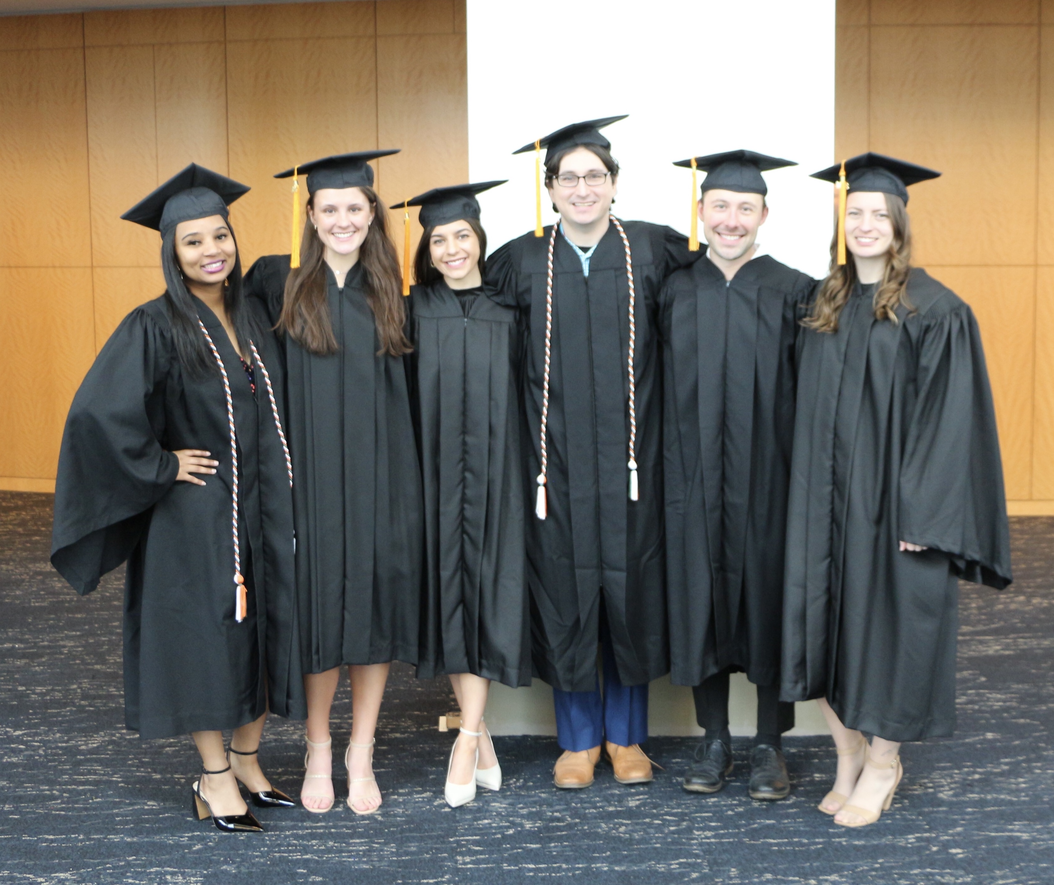 students in graduation gowns