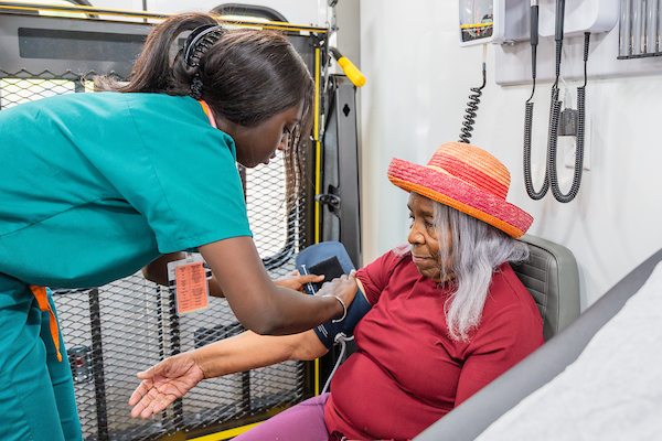 Nursing student with woman