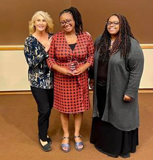 coordinator with two graduates