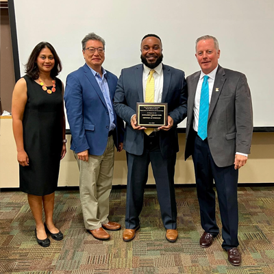 Faculty with award winner