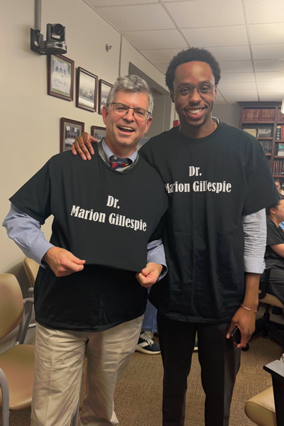 Resident and faculty with matching tshirts