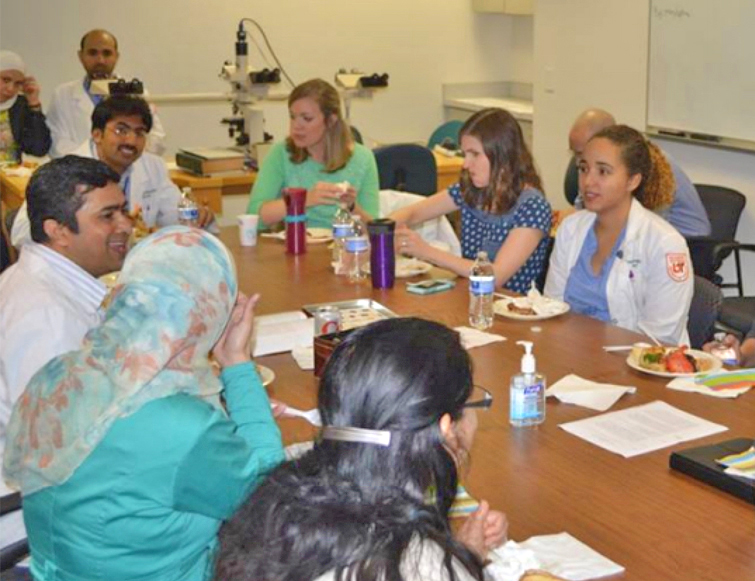 Residents sitting at a table