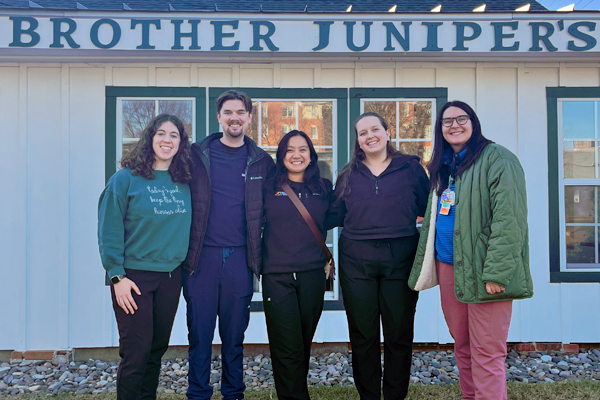 Five residents outside the Brother Juniper's restaurant