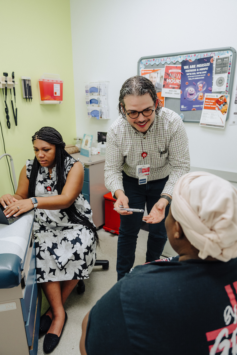 Ambulatory care fellows work with patient.