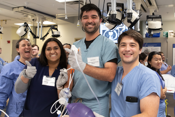 Fellows posing in a clinical training setting