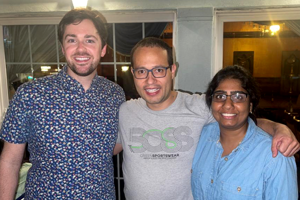 Three fellows taking a selfie in a house