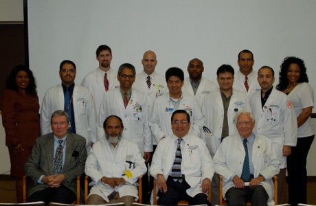 Faculty and fellows inside the Coleman Building