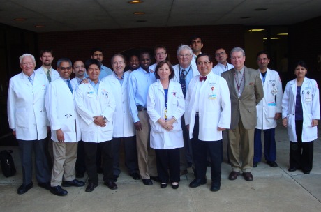 Faculty and fellows inside the Coleman Building