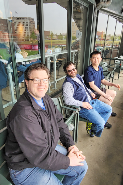 Residents sitting in the stadium outside the box seat room