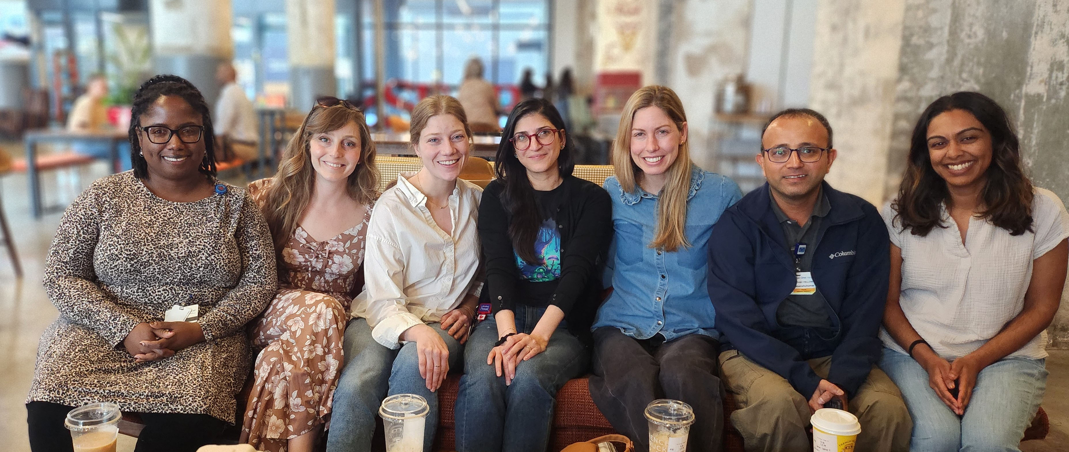 7 fellows in an indoor setting